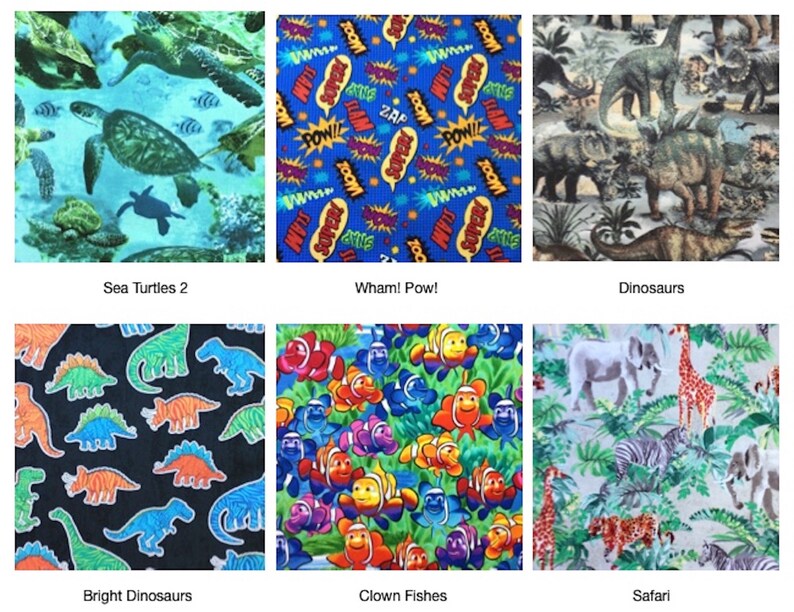 May include: A collection of six fabric swatches featuring various patterns: sea turtles in blue water, comic book sound effects, prehistoric dinosaurs, colorful outlined dinosaurs on black, clownfish in green seaweed, and safari animals.