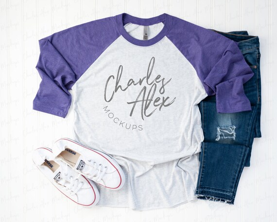 purple and white baseball shirt