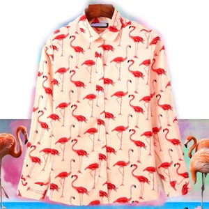 May include: A long-sleeved button-down shirt with a pink flamingo print on a peach background.