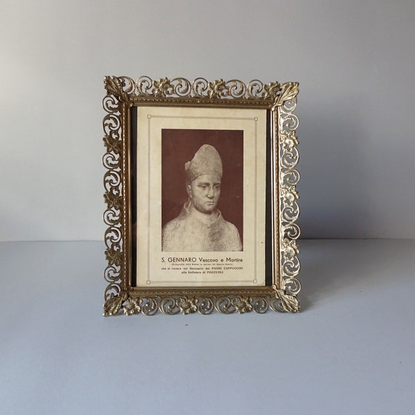 Vintage icon of San Gennaro (photograph of the marble statue from the 1400s) with baroque metal frame