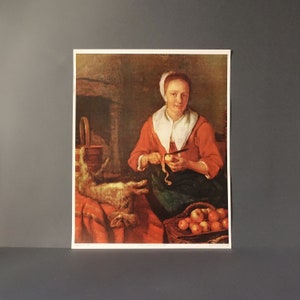 Stampa, una donna sbuccia le mele per cucinare con un coniglio. Pittura di Gabriel Metsu (1629-1667)