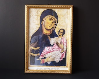 Sacred icon in golden wooden frame of the icon of the Madonna della Fonte, Trani - Church of Carmine.