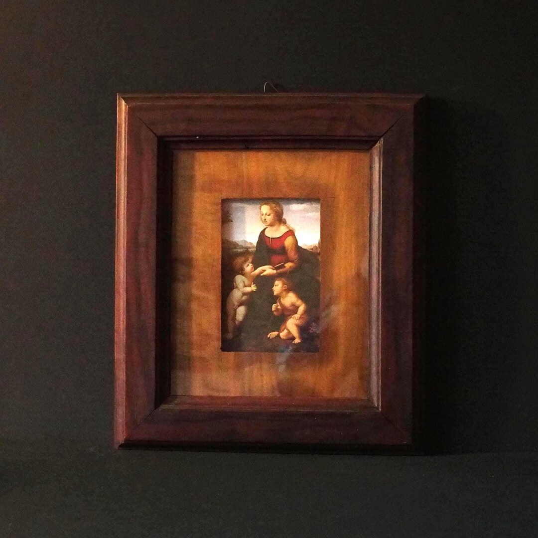 A Vintage Solid Wood Frame With a Print of the Madonna and Child With ...