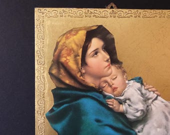 Gilded wood panel of the Madonna and Child by Ferruzzi in Florentine style.
