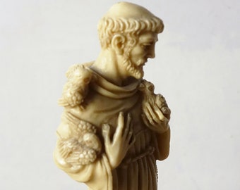Vintage icon sculpture of Saint Francis of Assisi handcrafted on ivory colored alabaster