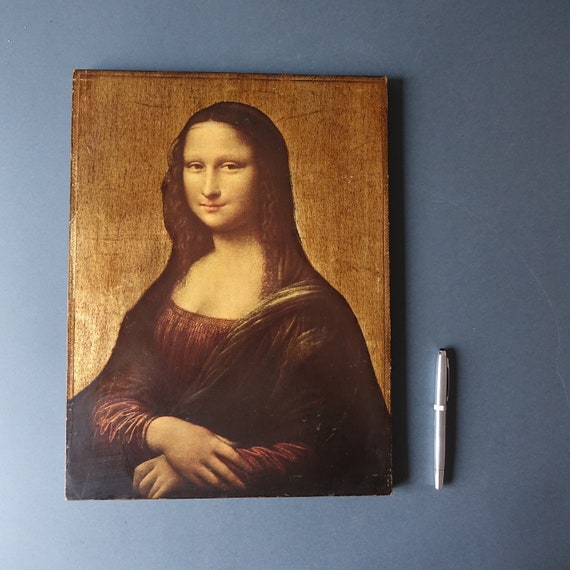 木と金箔のパネルに描かれたレオナルド・ダ・ヴィンチの「モナ・リザ