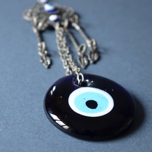 Silver Turkish Nazar Boncuk eye pendant with blue glass lucky eyes