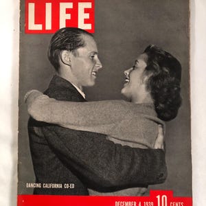 May include: Vintage LIFE magazine cover featuring a black and white image of a smiling couple embracing. The word "LIFE" is in a red box at the top. The cover also includes the text "DANCING CALIFORNIA CO-ED" and the date "DECEMBER 4, 1939".