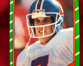 John Elway 1986 Topps Football Card # 112 Vintage Genuine Original Authentic EC100