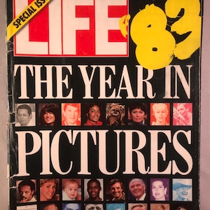May include: A vintage LIFE magazine cover from January 1984, featuring a yellow and black 'LIFE '82' logo and the text 'The Year in Pictures'. The cover features a grid of small photos of famous people from 1982.