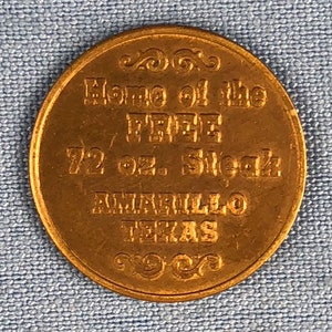 The Big Texan Free 72 oz Steak Home Amarillo Texas 25mm Brass Token Vintage TX Restaurant Souvnir Original Genuine ET626