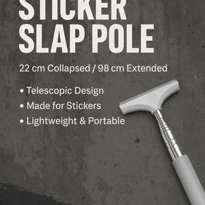 May include: A telescopic sticker slap pole with a white T-shaped head and a silver metal extendable shaft. The text reads: STICKER SLAP POLE, 22 cm Collapsed / 98 cm Extended, Telescopic Design, Made for Stickers, Lightweight & Portable.