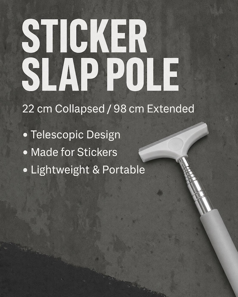 May include: A telescopic sticker slap pole with a white T-shaped head and a silver metal extendable shaft. The text reads: STICKER SLAP POLE, 22 cm Collapsed / 98 cm Extended, Telescopic Design, Made for Stickers, Lightweight & Portable.