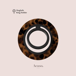 May include: A circular MagSafe ring holder with a brown and black tortoiseshell pattern. The device features a central black metal ring mechanism. The text "MagSafe Ring Holder" and "Acaso." are printed on the light background surrounding the object.