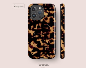 May include: A phone case featuring a brown and black tortoiseshell pattern with a circular MagSafe ring visible on the back. The case includes a camera cutout and side button covers. The text Made for MagSafe and Acaso. London are present.