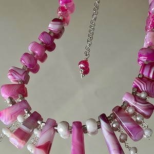 Sweet pink striped agate and silverit beads feature this romantic one-of-a-kind artisan piece