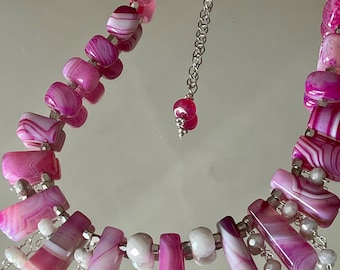 Sweet pink striped agate and silverit beads feature this romantic one-of-a-kind artisan piece