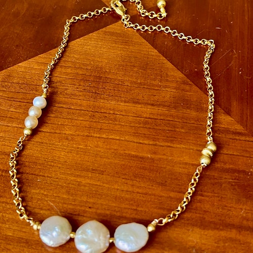 Designer pearl necklace shops