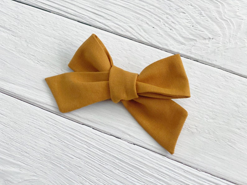 Mustard Baby Toddler Girl Bow Hair Accessory Cotton Bow Mustard Yellow Fall Colors Nylon Headband or Clip on Oversized Big Bow Knot