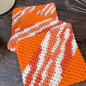 Three handmade orange pot holders - hot pads