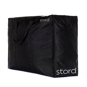 May include: Black storage bag with two handles and the word "stord" printed on the front and bottom.