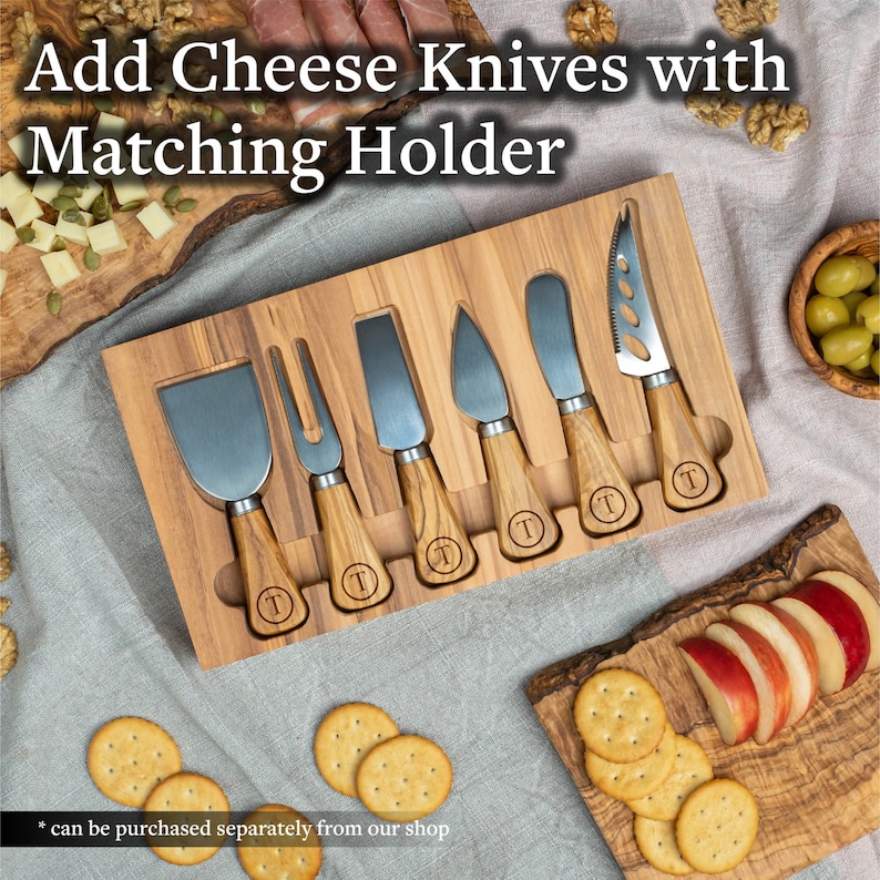 May include: A wooden cheese knife holder with six cheese knives. The knives have wooden handles and are arranged in a row. The holder is made of light brown wood and has a natural finish.