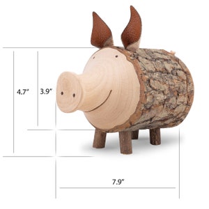 May include: A wooden piggy bank shaped like a pig with brown leather ears. The pig is 7.9 inches long, 4.7 inches tall, and 3.9 inches wide.