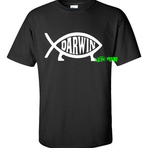 May include: Black t-shirt with a white fish symbol that says "DARWIN" inside. The text "I LIVE FAST" is below the fish.