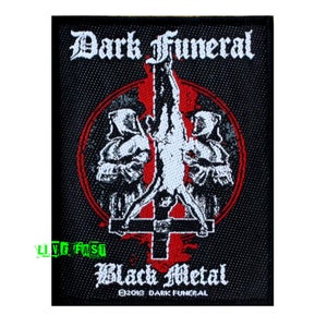 May include: Black and white embroidered patch with a red inverted cross and the text "Dark Funeral" and "Black Metal" on a black background.