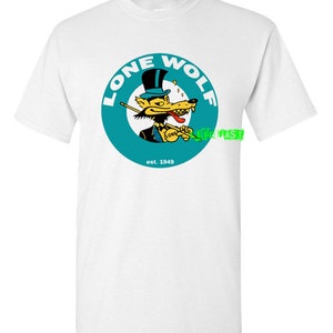 May include: White t-shirt with a teal circle graphic featuring a cartoon wolf wearing a top hat and holding a cue stick. The text "Lone Wolf" is written around the circle and "est. 1949" is written below the circle.