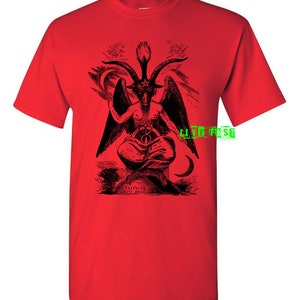 May include: Red t-shirt with a black and white image of a winged demon with horns and a pentagram on its forehead. The text "S.L.P.N.A.S. LEVI. OR. DEC." is printed below the image.