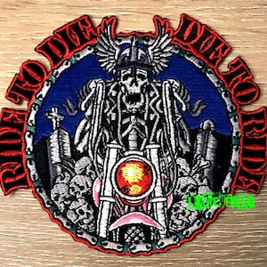 May include: Red, white, and black embroidered patch with a skeleton riding a motorcycle. The patch has a blue background and the text "Ride to Die Die to Ride" around the edge.