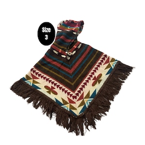 May include: A brown hooded poncho with a colorful geometric pattern and fringe. The poncho has a button closure and the text "Size 3" is visible.