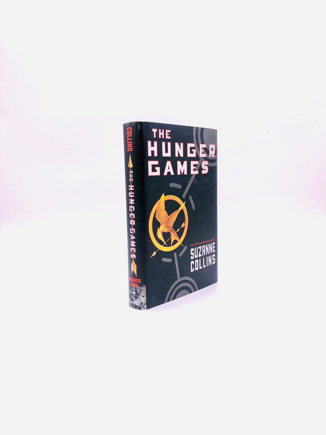 The Hunger Games. by Suzanne Collins. First Edition First 