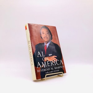 Al on America. Inscribed by Al Sharpton. First Edition, First Printing. Dafina Books. New York, 2002.