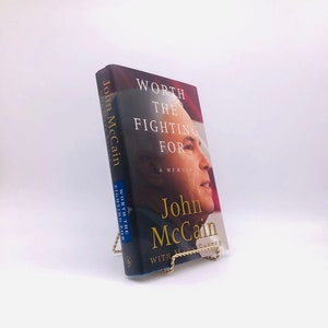 Worth the Fighting For. Inscribed by John McCain. First Trade Edition, First Printing. Random House. New York, 2003.