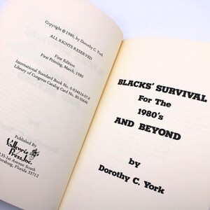 May include: An open book displaying the title "BLACKS' SURVIVAL For The 1980's AND BEYOND" by Dorothy C. York. The book's copyright is 1980, by Dorothy C. York. Published by Vallenrie Press, Inc. in St. Petersburg, Florida.