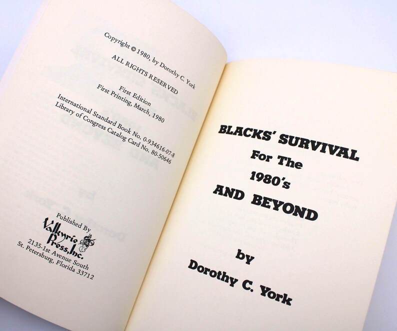 May include: An open book displaying the title "BLACKS' SURVIVAL For The 1980's AND BEYOND" by Dorothy C. York. The book's copyright is 1980, by Dorothy C. York. Published by Vallenrie Press, Inc. in St. Petersburg, Florida.