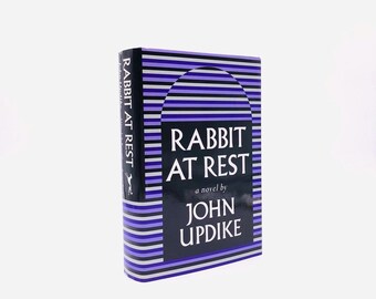 Rabbit at Rest. Inscribed by John Updike. First Trade Edition, First Printing. Knopf. New York, 1990.