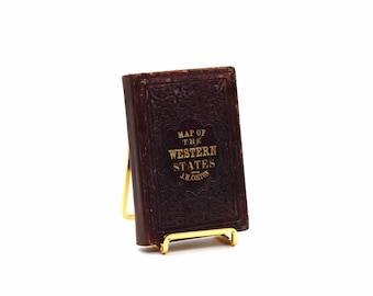 Mapa ferroviario y de municipios de los estados del oeste. Por J.H. Colton. Mapa plegable litográfico. Coloreado a mano. J.H. Colton & Co., Nueva York, 1855.