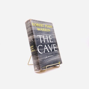 The Cave. By Robert Penn Warren. First Edition, First Printing. Random House. New York, 1959.