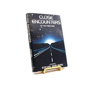 Close Encounters of the Third Kind. By Steven Spielberg. Book Club Edition. Delacorte. New York, 1978.