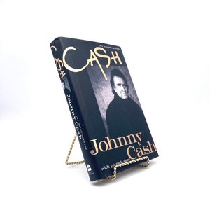 Bargeld: Die Autobiographie. Signiert von Johnny Cash. Erstausgabe, Erstdruck. HarperCollins. San Francisco, 1997.