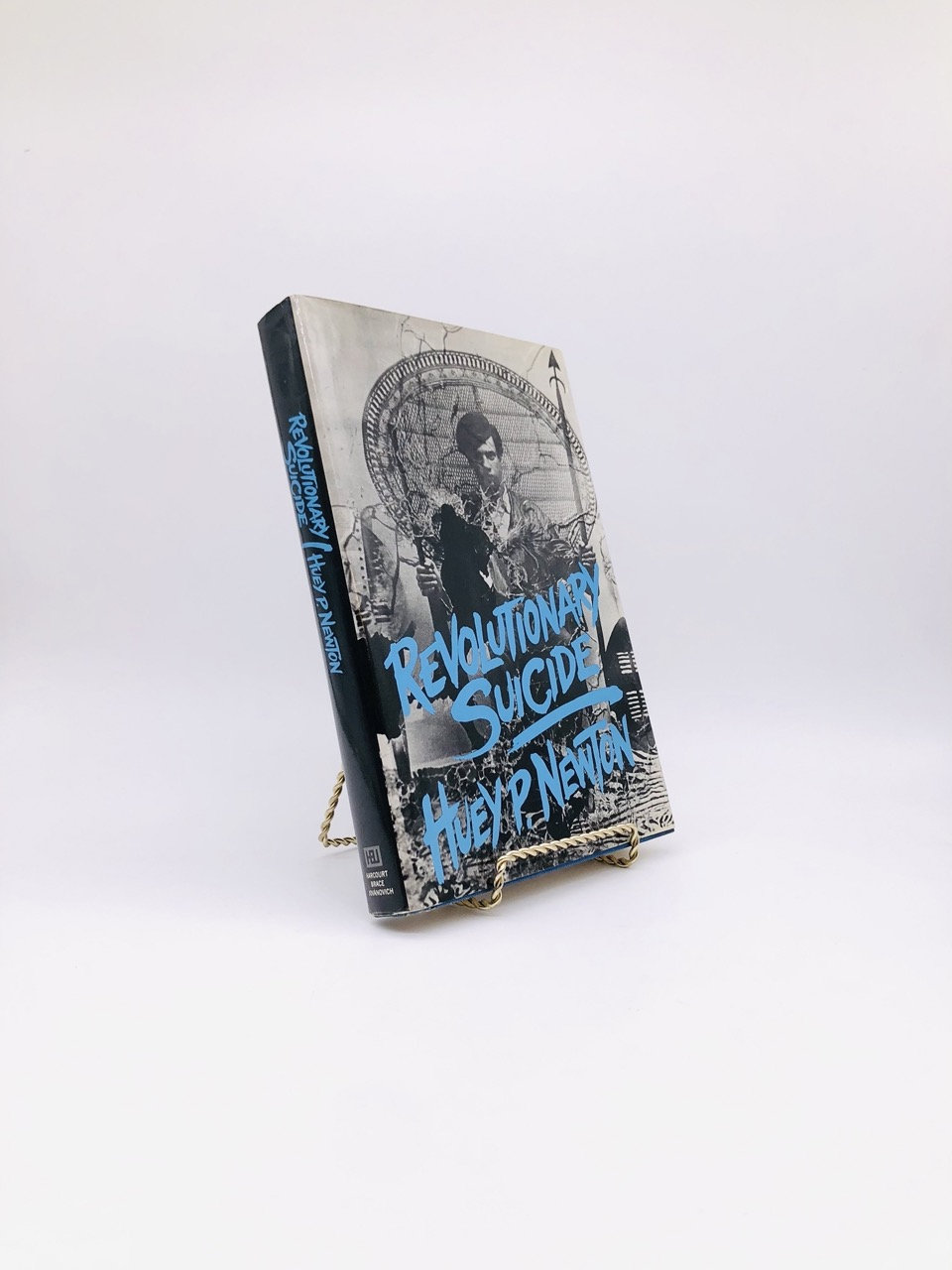 Revolutionary Suicide. By Huey P. Newton. Assisted by J. Herman Blake. First Edition, First Printing. Harcourt, Brace. New York, 1973.