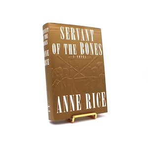 Servant of the Bones. Inscribed by Anne Rice. First Edition, First Printing. Knopf. New York, 1996.