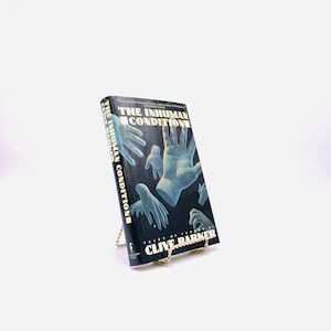 Der unmenschliche Zustand . Signiert von Clive Barker. Erste Auflage, Erstdruck. Poseidon-Presse. New York, 1986.