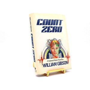 Count Zero. Signed by William Gibson. First Edition, First Printing. Arbor House. New York, 1986.
