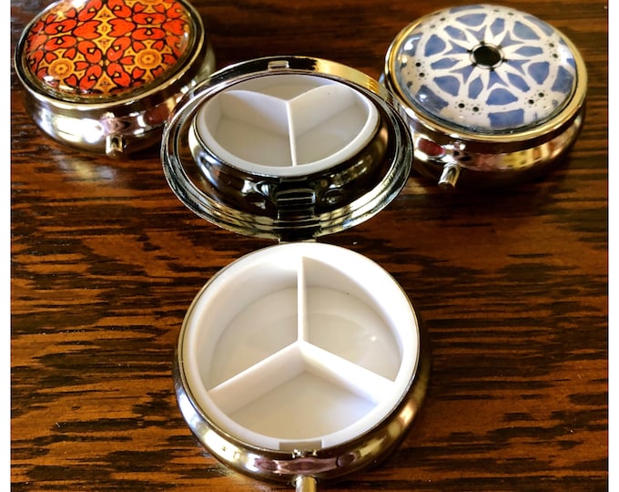 Pill Boxes with Vivid, Original Designs Set on Stainless Steel Base, Functional and Fabulous