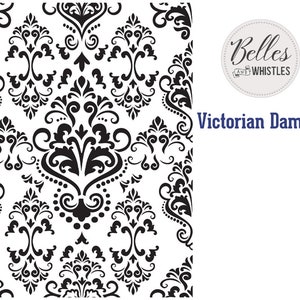 May include: Black and white Victorian damask pattern with a circular logo that says "Belles and Whistles" in a script font. The text "Victorian Damask" is in blue text below the logo.