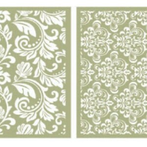 May include: Two square decorative panels with white floral patterns on a light green background. One panel features a swirling design with leaves and flowers, while the other has a symmetrical, repeating pattern. Ideal for home decor or craft projects.